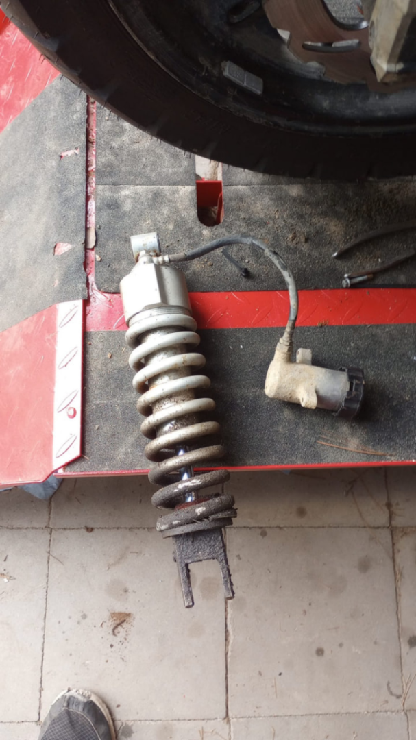Out with the old stock 650 shock to a slightly used 1000 shock with a stiffer spring