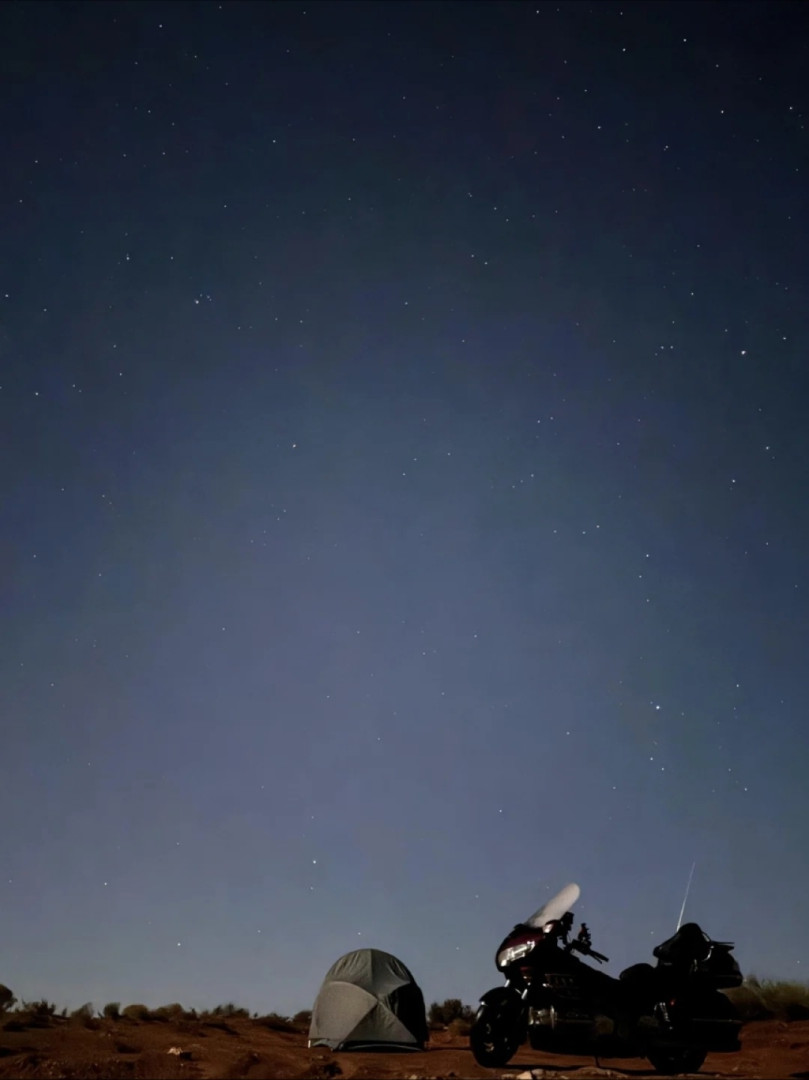 Camping under the night sky
