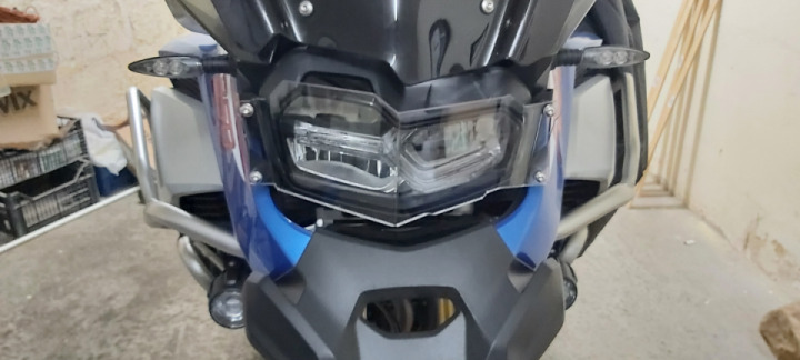 Adding the headlight protection from road debris.