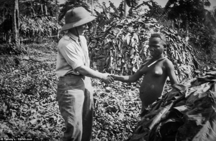 Florence Blenkiron shakes hands with a woman she met during her extraordinary adventure. Toovy explains the lack of pictures featuring the two women:& 'They weren't taking selfies with their camera back then. The ladies are there, but they're not the main focus of the photographs'&