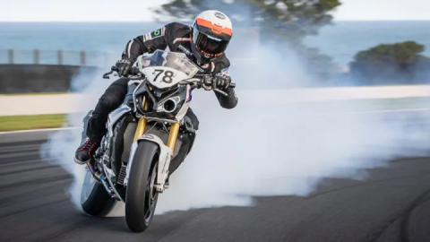 Stunt rider Lukey Luke wheelies into the sunset