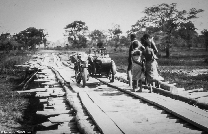 In total, 66 slides will be auctioned off in one lot, which is estimated to go for between £500 and £800. Toovey continued: 'We've got a collection of 66 slides, all photographic slides, along their journey - the crossing of Africa 1934 and 1935.' Pictured: A rough road made from timber bears the motorbike's weight&