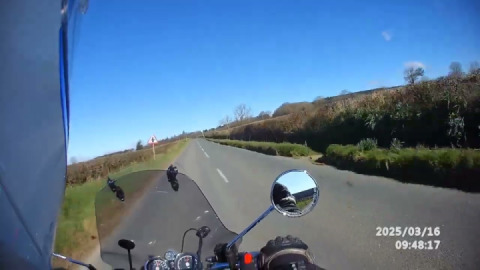 Patiently waiting for a safe and legal opportunity to overtake.