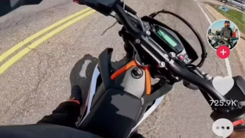 Convenient cop right there to help a beginner motorcyclist.