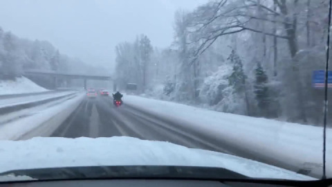 This guy must be nuts to ride in this weather. Mad Respect to this guy for attempting this