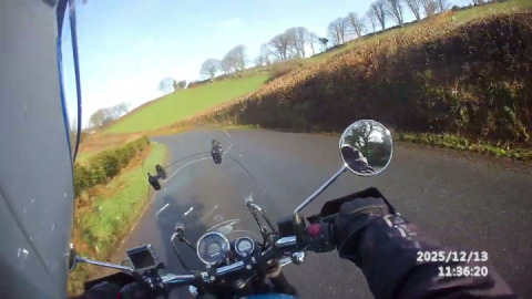 Glorious scenery and bends as my meteor 350 cruises down the B3212 into Doccombe.