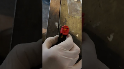 Disconnecting the regulator to the alternator on a Royal Enfield Interceptor 650.