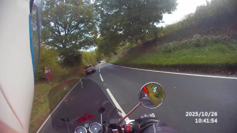 Enjoying a few of the many bends on the road from Crediton to Bickleigh.
