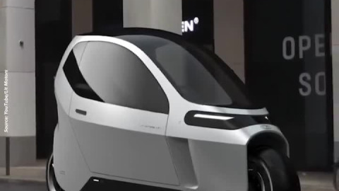 Self-balancing, fully-enclosed electric motorcycle.